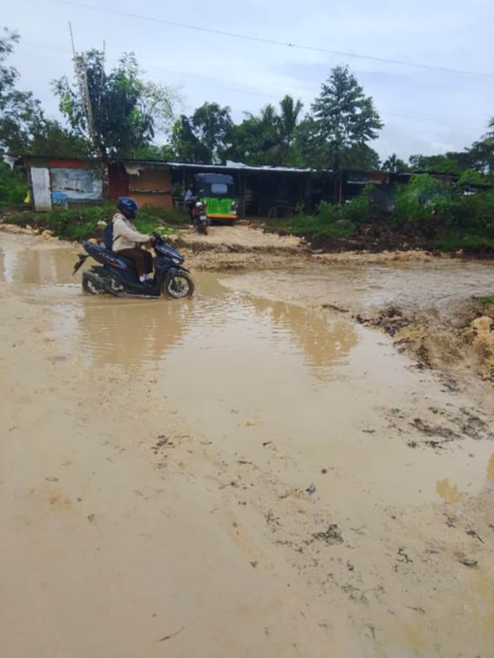 Muddy Access Road Challenges Students and Teachers of Dr. Cecilio Putong National High School in Bohol Muddy Access Road Challenges Students and Teachers of Dr. Cecilio Putong National High School in Bohol
